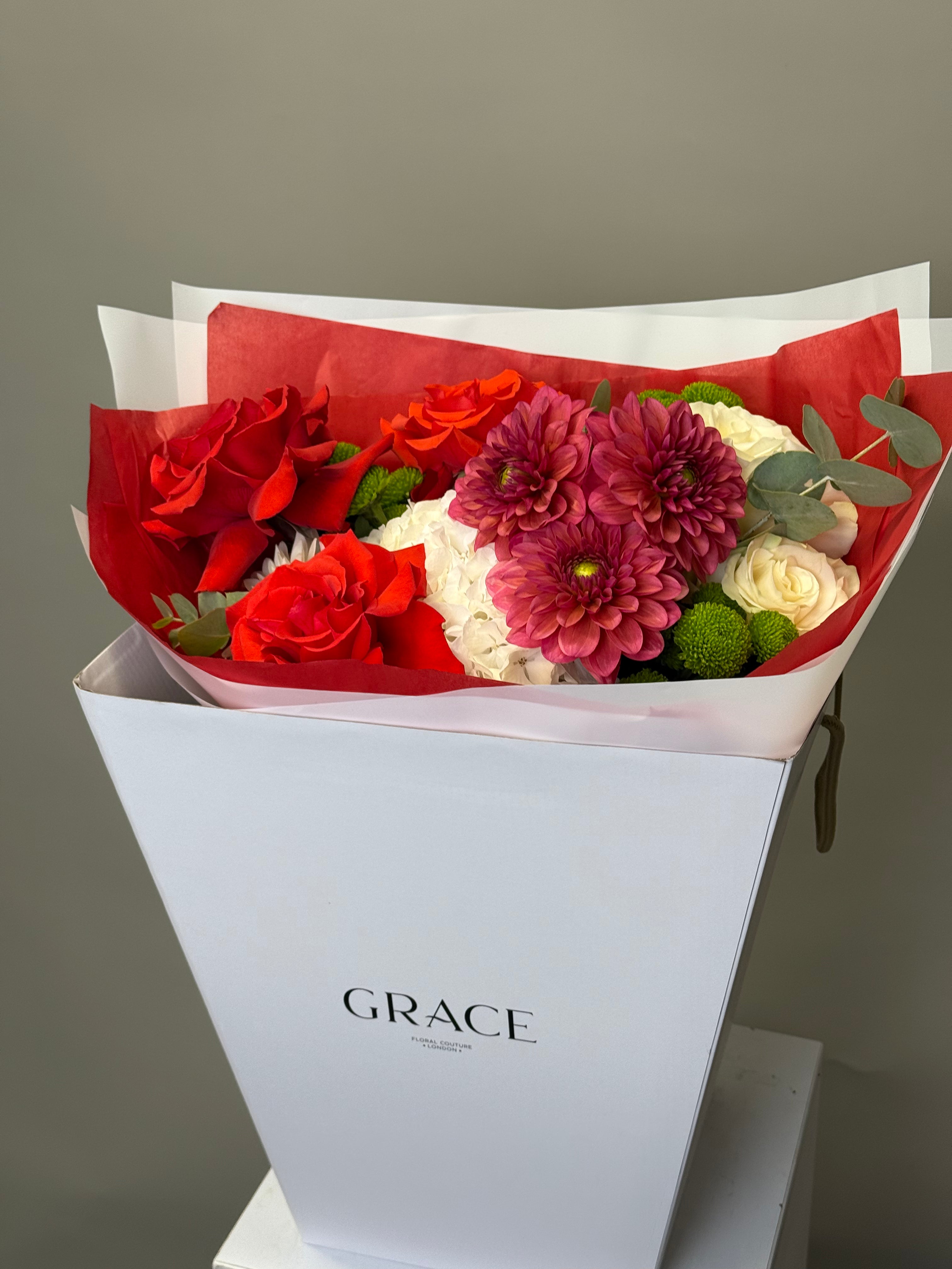 Close-up of red and burgundy bouquet with white roses and dahlia, Grace Floral Couture London