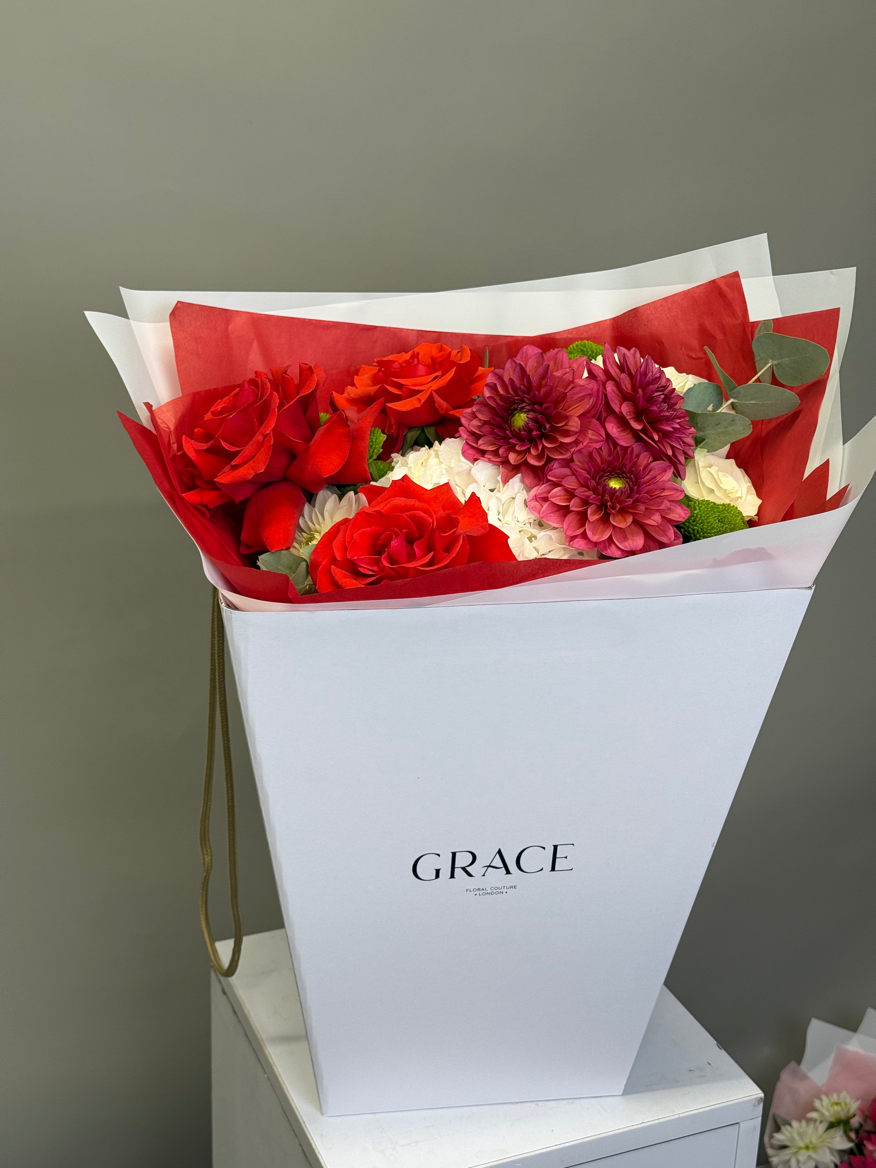 Bouquet Red from Grace Floral London — red roses, burgundy dahlia, white hydrangea and green chrysanthemums in white GRACE branded gift box