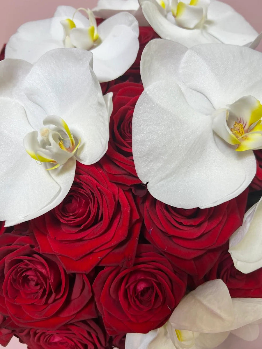 Red roses with orchid