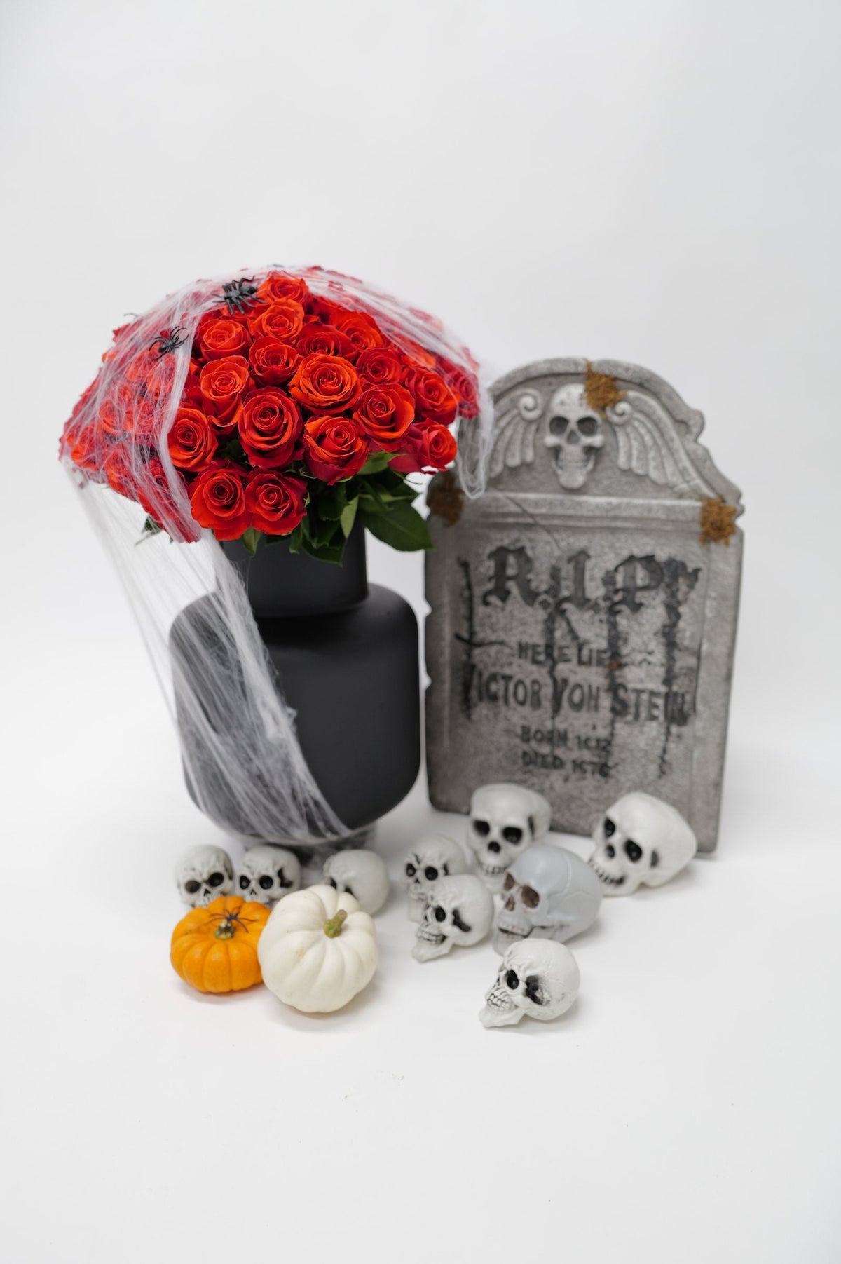 Red spooky arrangement in a vase